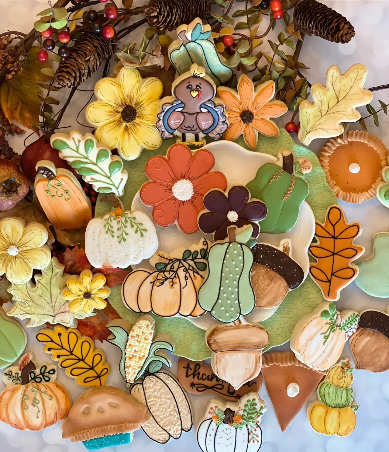 Thanksgiving cookies featuring turkey and seasonal motifs.