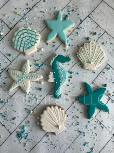 Nautical-themed decorated cookies assortment