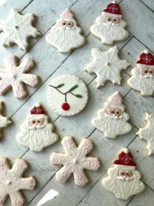 Decorated Santa and snowflake cookies display